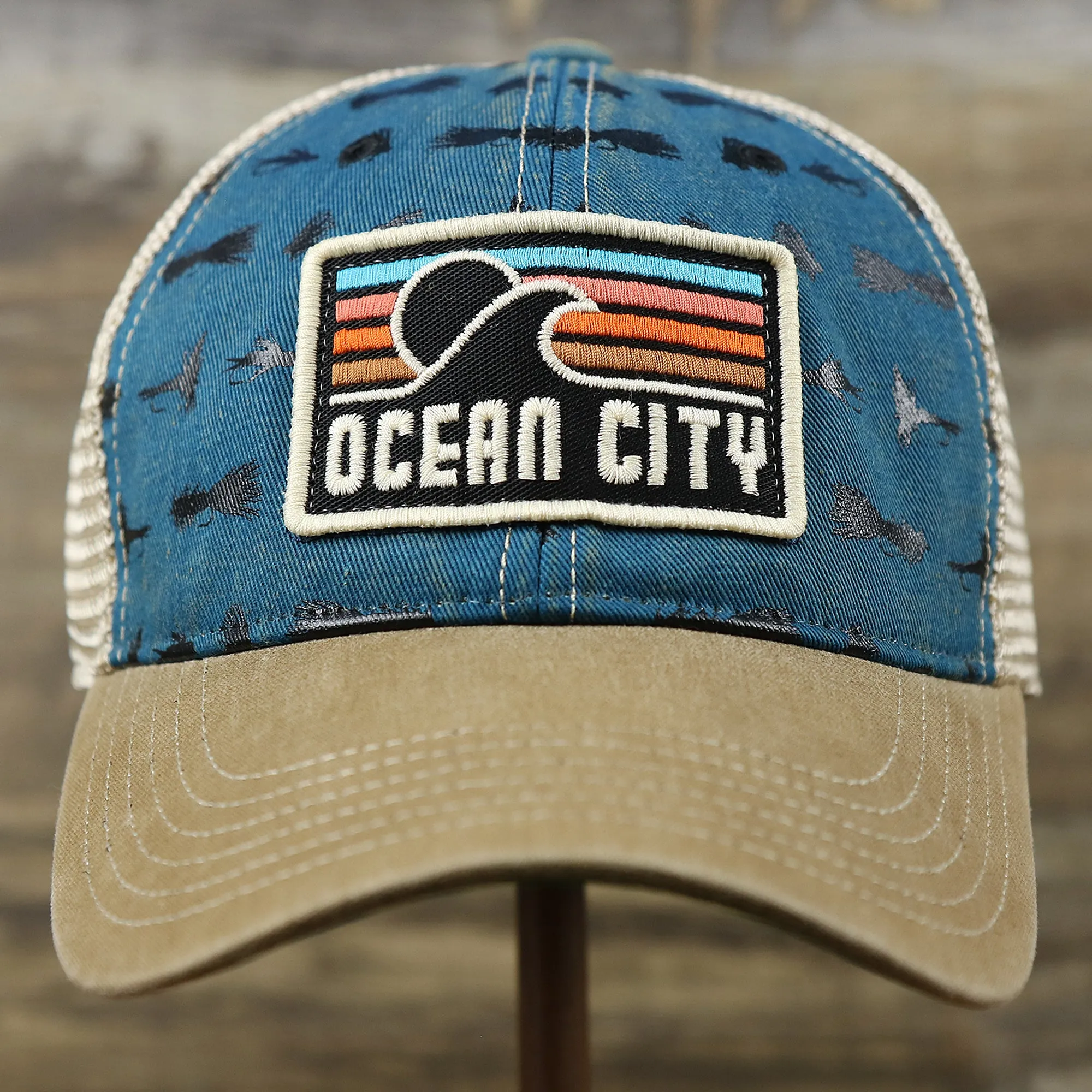 Ocean City Sunset Patch Fishing Lure Print Mesh Back Trucker Hat | Marine Blue Trucker Hat