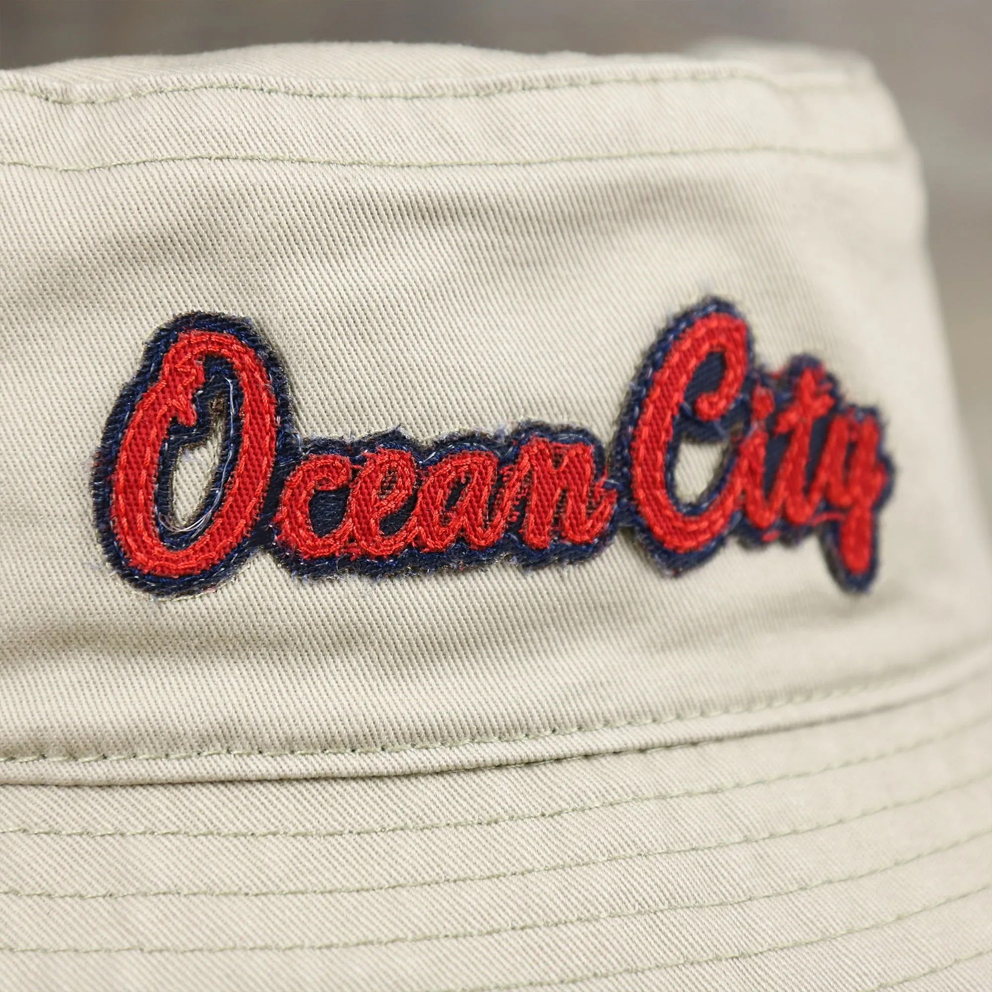 Red OCNJ Double Wordmark Navy Blue Outline Bucket Hat | Khaki Bucket Hat